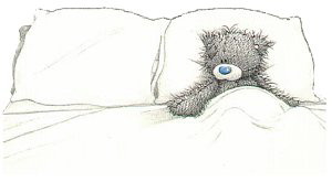 Мишка Тедди в кровате