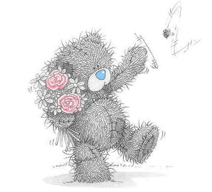 Мишка Тедди с охапкой цветов